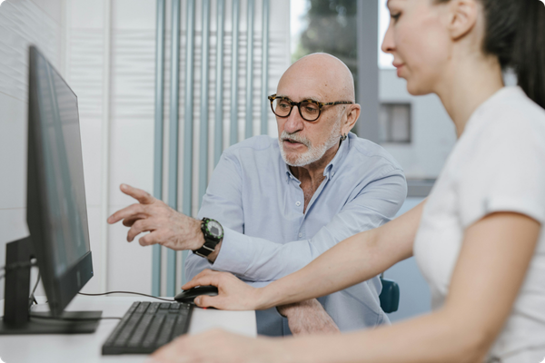 Healthcare professional reviewing population health data